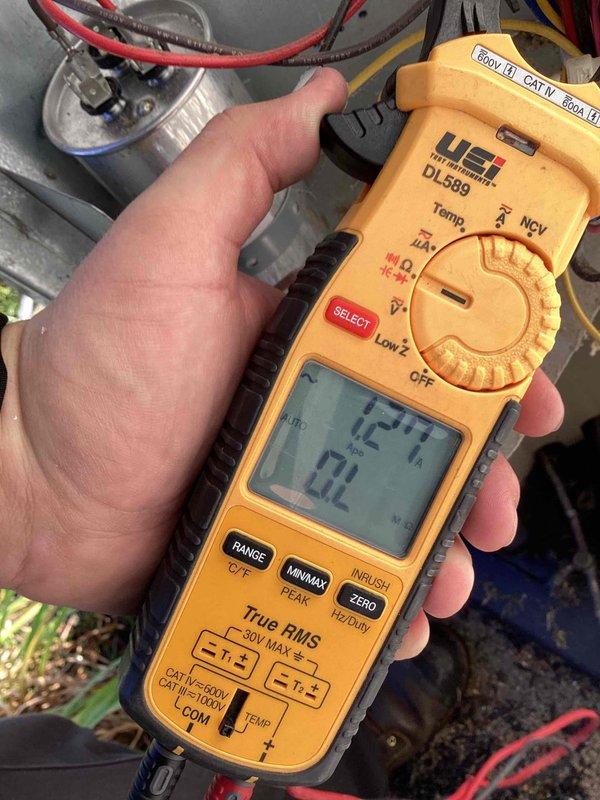 Completed comprehensive cooling maintenance on a 9-year-old residential air conditioning system. Performed standard tune-up procedures including inspection of outdoor condenser unit, electrical measurements using digital multimeter to verify proper amperage and voltage readings, and system performance evaluation. System found to be operating within normal parameters with no deficiencies noted.