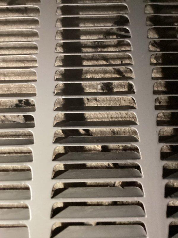 Responded to no cooling call on 15-year-old residential air conditioning system with condenser unit failing to operate. Upon arrival, performed diagnostic evaluation of outdoor unit and electrical components. Confirmed condenser not engaging when thermostat called for cooling. Inspected return air grilles and found significant dust and debris accumulation restricting airflow throughout system. Cleaned return air vents to restore proper air circulation. Tested capacitor, contactor, and compressor functionality. Identified failed dual run capacitor preventing condenser operation. Replaced capacitor with appropriate rated component. Verified proper voltage and amperage readings. Cycled system through multiple cooling cycles to confirm condenser engagement and proper operation. System restored to full cooling capacity with adequate airflow. Recommended regular filter maintenance and periodic professional cleaning to prevent future airflow restrictions.