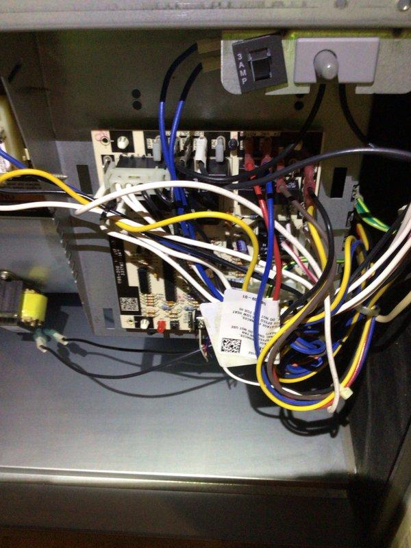 Completed comprehensive cooling maintenance on a 9-year-old air conditioning system. Performed standard tune-up procedures including inspection of electrical components, control board, and wiring connections within the unit's control panel. Evaluated and documented air filter condition, noting previous maintenance date marking. System tested and confirmed operational with all components functioning properly.