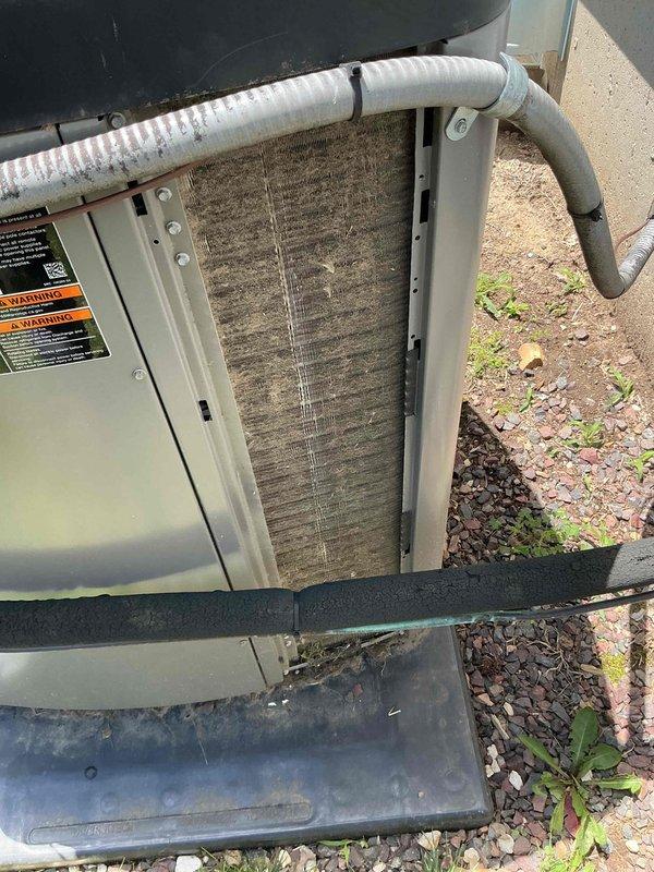 Completed comprehensive cooling maintenance on a 9-year-old air conditioning system. Replaced heavily soiled air filter and cleaned outdoor condenser unit which had significant dirt and debris accumulation on coil surfaces. Performed full system inspection, verified proper refrigerant line connections and insulation, confirmed unit operational status, and system is functioning properly.