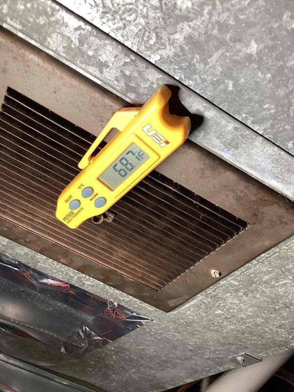Responded to no cooling call with pressure error displayed on thermostat for unit U10 located at rear of property. Upon inspection, found heavily soiled air filter restricting airflow to system. Replaced dirty filter and verified evaporator coil temperature reading of 62.6°F, confirming proper refrigerant operation and system cooling performance. Cleared pressure error from thermostat and restored unit to normal operation.