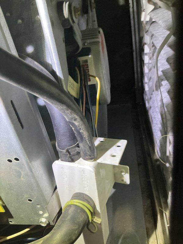 Responded to no cooling complaint on 10+ year old American Standard unit located on side of home. Upon arrival, diagnosed system experiencing operational difficulties with unusual noise during startup and insufficient airflow. Inspected air handler components, refrigerant lines, and electrical connections. Identified and resolved issue preventing proper system operation, restoring cooling function to unit.