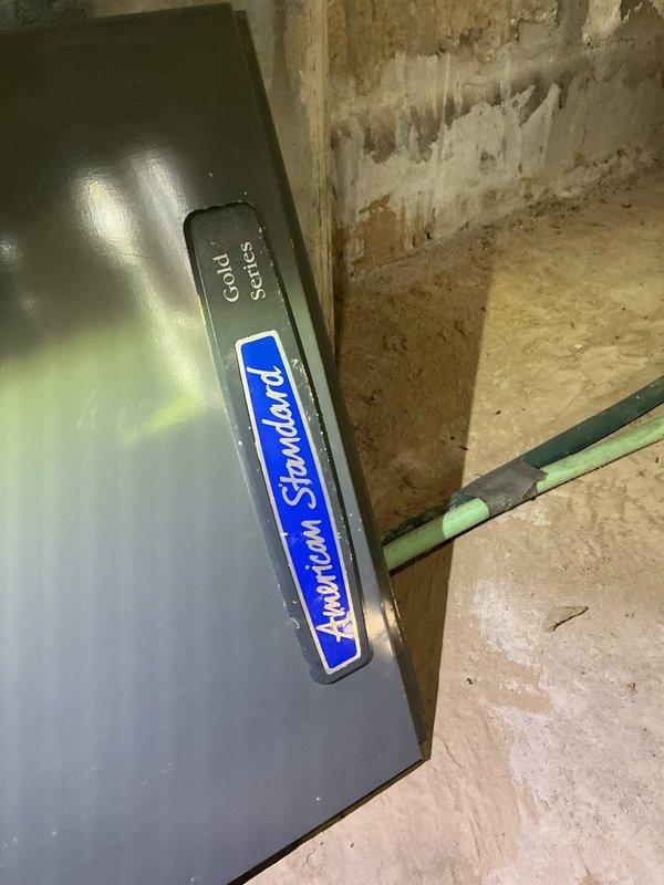 Responded to no cooling complaint on 10+ year old American Standard unit located on side of home. Upon arrival, diagnosed system experiencing operational difficulties with unusual noise during startup and insufficient airflow. Inspected air handler components, refrigerant lines, and electrical connections. Identified and resolved issue preventing proper system operation, restoring cooling function to unit.