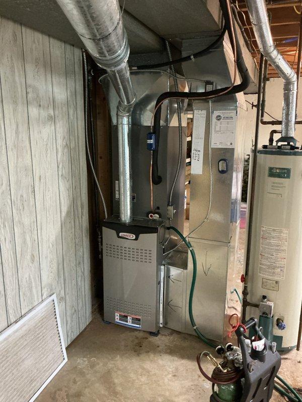 Replaced failed evaporator coil on residential HVAC system. Retrieved replacement coil from Lennox Earth City will call and installed in air handler unit located in basement mechanical room. System tested and verified operational with proper refrigerant pressures and temperatures using digital manifold gauges. Defective coil removed and disposed of per protocol. Unit restored to full heating and cooling operation.
