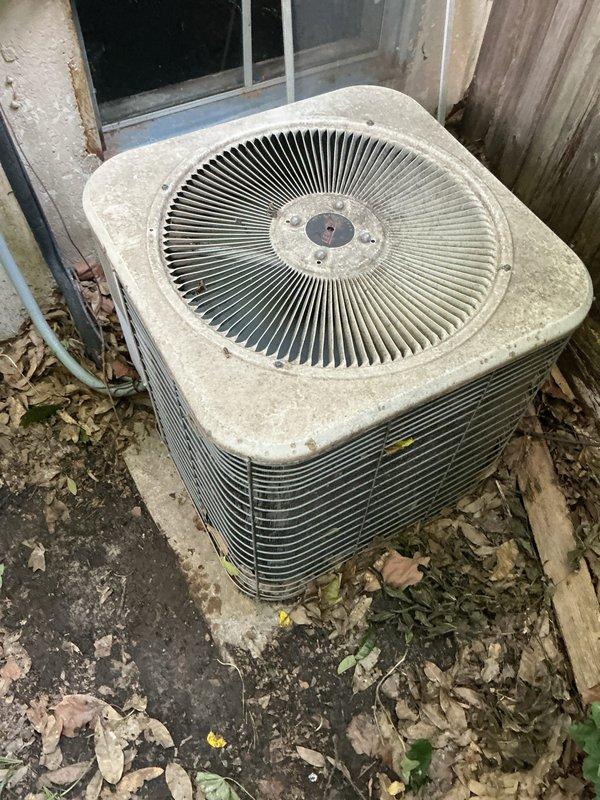 Responded to no cooling complaint for multi-zone system serving second and third floors. Upon arrival, found outdoor condenser unit operational but covered with debris and organic matter accumulation affecting airflow and heat transfer efficiency. Cleaned condenser coils, removed leaf debris from unit base and surrounding area, and cleared obstructions from cooling fins. Verified proper system operation, confirmed adequate cooling output, and restored normal temperature control to affected zones.