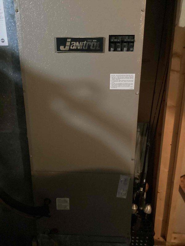 Responded to no cooling complaint on residential split system with Janitrol air handler and outdoor condensing unit. Upon arrival, confirmed unit was not operating. Performed complete system diagnostics including electrical testing, refrigerant pressure checks, and component inspection. Identified failed capacitor on outdoor condenser unit preventing compressor operation. Replaced defective dual run capacitor with proper OEM specification replacement. Verified proper amperage draw on compressor and fan motor. Tested system operation through complete cooling cycle, confirmed adequate airflow at registers, and verified proper temperature split across evaporator coil. System restored to full operational status with normal cooling capacity.