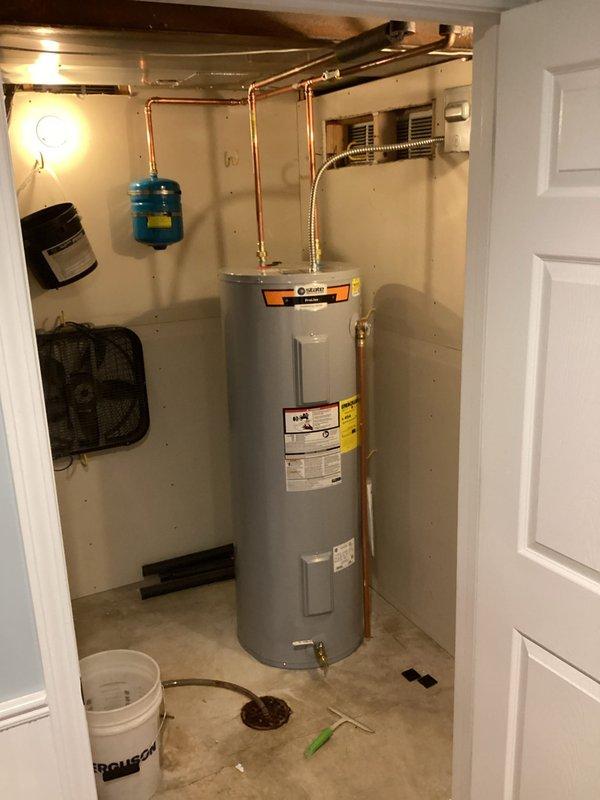 Responded to callback for 50-gallon electric water heater installed earlier same day that was reported as not working. Upon arrival, inspected installation including all plumbing connections, copper piping, expansion tank, PRV, and electrical connections at breaker panel. Verified proper wiring, confirmed breaker engagement, and tested unit operation. Troubleshot electrical supply and heating elements to resolve non-operational issue. Unit restored to full working condition with hot water production confirmed before departure.
