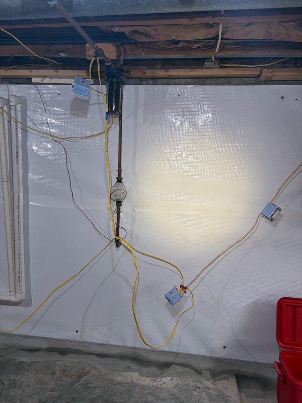 Removed multiple abandoned electrical wires hanging from the garage ceiling, leaving only one active circuit connected to an existing switch as requested. Installed a new receptacle to provide additional power access in the garage workspace. All remaining wiring was properly secured and terminated in code-compliant junction boxes mounted to the ceiling joists.