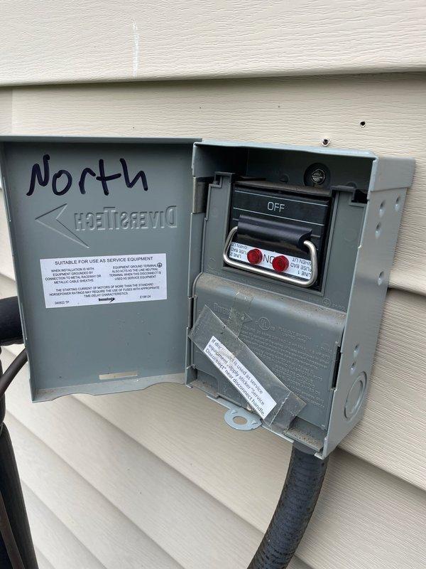 Responded to callback for cooling system not reaching set temperature. Upon arrival, found outdoor disconnect switch in OFF position at side yard unit. Verified thermostat set to 80°F and confirmed batteries operational. Reset disconnect to ON position and restored power to condensing unit. System energized successfully and began cooling cycle. Verified proper thermostat communication and compressor operation. Unit now functioning normally and cooling to desired setpoint.