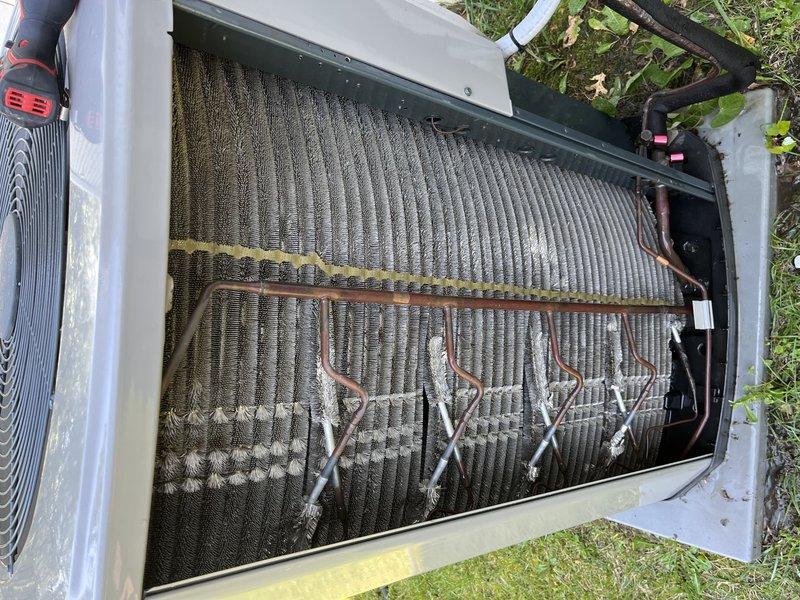 Completed furnace control board replacement on HVAC system. Removed and replaced failed control board which exhibited visible corrosion and burn damage on multiple solder joints. During service, inspected outdoor condensing unit and documented significant debris accumulation on evaporator coil fins requiring future attention. System restored to operational status with temporary cooling capability confirmed. Defective board discarded per protocol.