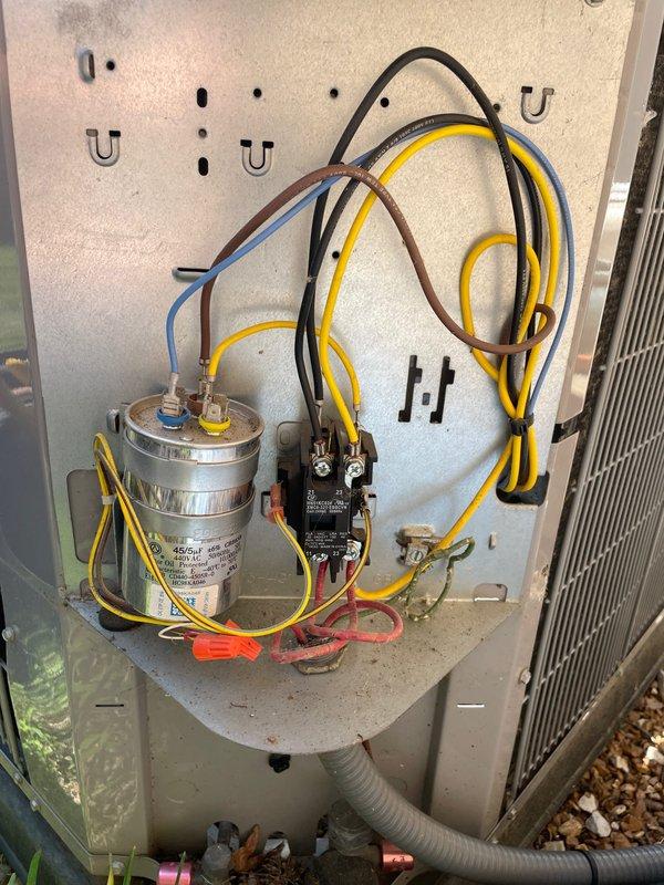 Responded to no-cool complaint on residential air conditioning system less than 10 years old located in backyard. Upon arrival, customer reported unit not maintaining set temperature. Performed diagnostic evaluation of outdoor condensing unit and identified failed run capacitor as root cause of cooling deficiency. Measured compressor amperage at 38.61 amps during testing to verify electrical performance. Accessed electrical compartment and inspected capacitor, contactor, and associated wiring connections. Replaced defective capacitor with proper replacement unit and verified all electrical connections were secure. Cycled system through complete operational test to confirm proper compressor startup and normal amperage draw. Unit returned to full cooling capacity with all components functioning within manufacturer specifications. Advised customer to monitor system performance and provided guidance on thermostat operation.