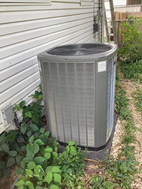 Responded to no cooling complaint on residential air conditioning system. Upon inspection, found failed dual run capacitor with visible corrosion and discoloration on terminal connections. Replaced defective capacitor with new unit, restored system to proper operation, and verified cooling performance. Unit tested and left operational.