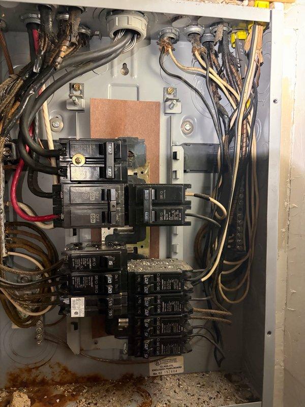 Responded to follow-up service call for no cooling issue related to electrical panel. Upon inspection, discovered severely damaged circuit breaker with extensive charring, melting, and burn marks indicating electrical arcing or overheating event. Replaced damaged breaker, cleaned debris and residue from surrounding components, verified all connections were secure, and confirmed proper panel operation. System restored to safe working condition.