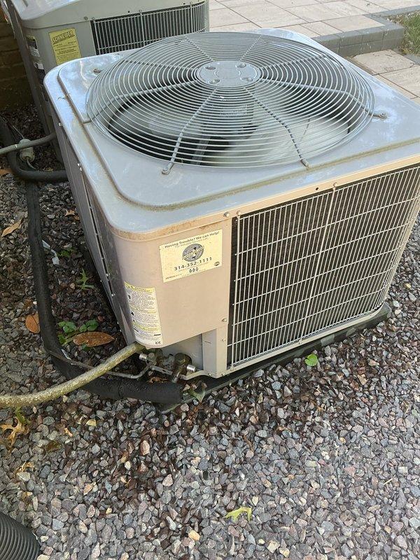 Responded to no cool complaint on 2-zone system with 10+ year old equipment. Upon arrival, performed diagnostic inspection of indoor air handler and outdoor condenser unit. Inspected air filter at indoor unit which showed restriction, checked system operation and airflow. Evaluated outdoor condenser unit condition including fan operation, refrigerant lines, and overall system performance. Documented equipment condition with photos showing both indoor furnace/air handler combination unit in mechanical room and outdoor condensing unit on gravel pad. System assessed for proper cooling operation across both zones.