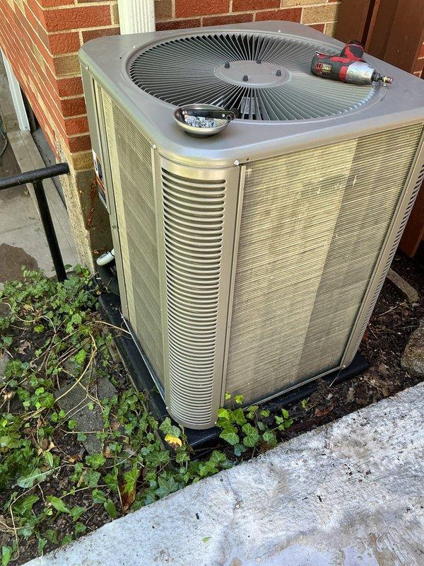Responded to emergency service call for water leak in front of and inside furnace. Upon arrival, inspected 2021-installed furnace and Lennox air conditioning system to identify source of water intrusion. Determined leak was originating from condensate drainage issue related to outdoor AC unit, as evidenced by moisture accumulation around equipment and algae growth on foundation indicating ongoing drainage problem. Cleared condensate line blockage, verified proper drainage flow from evaporator coil, and confirmed no water penetration into furnace cabinet that could damage blower motor or control board. Tested system operation to ensure proper function and no further water accumulation.