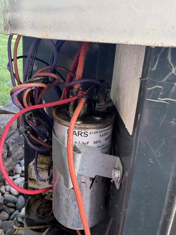 Responded to no-cooling callback on outdoor condensing unit. Upon arrival, inspected electrical components and found failed dual-run capacitor preventing compressor and condenser fan operation. Replaced defective capacitor with proper rated replacement, verified all wire connections secure, and tested system operation. Unit now cooling properly with normal amperage draw on both compressor and fan motor.