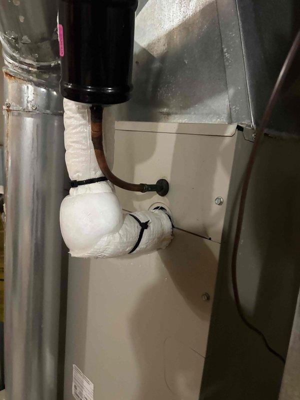 Responded to no cooling complaint on 11-year-old Heil system located in basement. Upon arrival, verified thermostat set to 71°F with indoor temperature reading 74°F. Performed diagnostic evaluation of air handler and refrigerant lines. Inspected evaporator coil assembly, blower motor operation, and condensate drainage system. Checked refrigerant line insulation and connections for proper installation and potential leaks. Contacted owner to discuss findings and provide repair options for approval before proceeding with necessary corrections to restore cooling functionality.