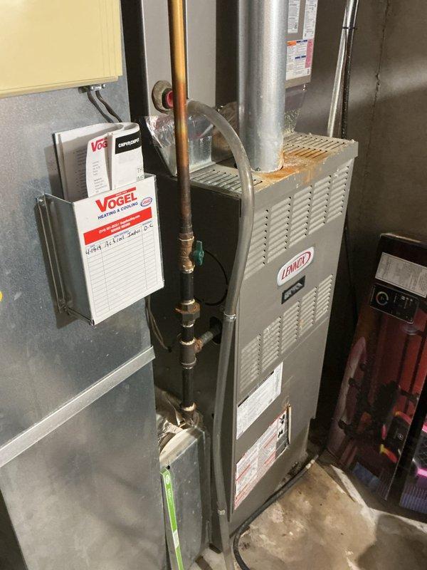 Responded to no cooling complaint on residential HVAC system. Upon arrival, inspected Lennox furnace unit and associated air conditioning components in basement mechanical room. Documented existing equipment installation including ductwork connections, refrigerant lines, and electrical connections. Assessed outdoor condensing unit condition and verified proper placement. System was previously advised to be shut off with fan left in circulation mode prior to service visit. Conducted visual inspection of indoor and outdoor equipment to identify cause of cooling failure and documented equipment condition for diagnostic purposes.