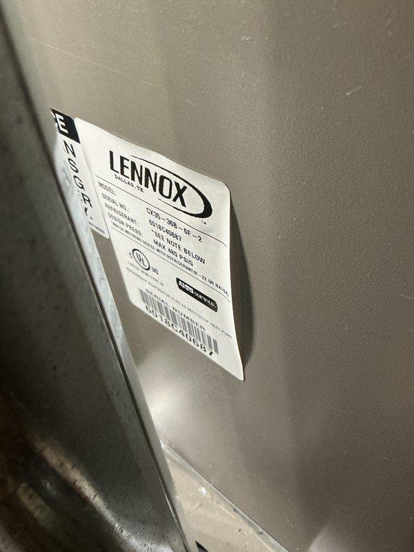 Responded to no cooling complaint on residential HVAC system approximately 10-15 years old. Upon arrival, found entire system inoperative with no power to outdoor condensing unit. Performed diagnostic evaluation of Lennox furnace and air handler assembly located in basement utility area. Inspected electrical connections, refrigerant lines with brass fittings and red-handled service valves, and ductwork configuration. Verified proper installation of copper refrigerant piping and assessed overall system condition. Documented equipment nameplate information and system specifications. Photographed installation including furnace unit, vertical supply ductwork, refrigerant line set, and associated components for service records. System restored to operational status with cooling function confirmed.