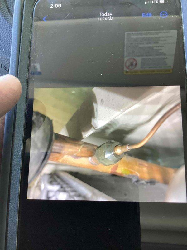 Replaced defective thermostatic expansion valve (TXV) and bi-flow filter drier on HVAC system experiencing intermittent heating and cooling operation. Brazed new components into refrigerant line set, evacuated system, and recharged to manufacturer specifications. System tested and confirmed operating properly with normal temperatures and pressures restored.