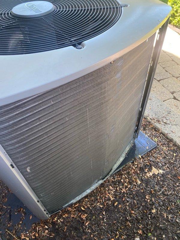 Performed comprehensive cooling maintenance on two outdoor air conditioning condenser units for a 9-year-old Lennox Elite system. Cleaned both condenser coils and exterior louvers, removing accumulated dust, pollen, and outdoor debris. Inspected control boards, electrical connections, and wiring harnesses within the air handler cabinet, verifying all components operational. Completed full system performance evaluation with all equipment functioning properly at time of service.