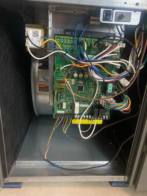 Performed comprehensive cooling maintenance on two outdoor air conditioning condenser units for a 9-year-old Lennox Elite system. Cleaned both condenser coils and exterior louvers, removing accumulated dust, pollen, and outdoor debris. Inspected control boards, electrical connections, and wiring harnesses within the air handler cabinet, verifying all components operational. Completed full system performance evaluation with all equipment functioning properly at time of service.