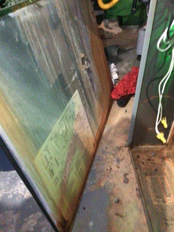 Responded to no cooling complaint on unit 10 located on side of home. Upon arrival, performed system diagnostics and inspection of both heating and cooling components. Opened unit cabinet to access internal components including heat exchanger assembly, burner tubes, and control board. Verified power supply to system with green LED indicator illuminated on circuit board. Inspected all wire connections including thermostat wiring (green, yellow, red, blue, and white) for proper termination and secure connections. Examined refrigerant line sets and condensate drainage system for proper operation. System restored to normal cooling operation.