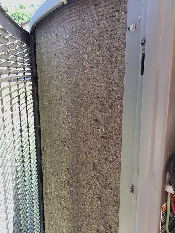 Responded to no cooling complaint on ground-level basement unit. Upon inspection, discovered severely clogged air filter with heavy dust and debris accumulation restricting airflow. Removed and replaced dirty filter with new filter. Filter had not been serviced in extended period, causing insufficient air circulation and warm air discharge. Unit restored to proper cooling operation after filter replacement. Advised homeowner on importance of regular filter maintenance every 1-3 months to prevent future airflow restrictions and maintain system efficiency.