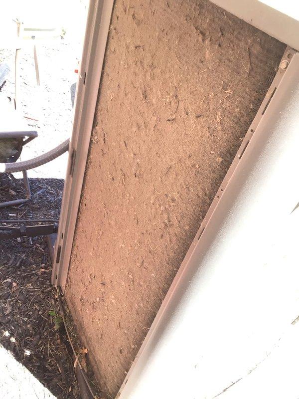 Responded to no cooling complaint on ground-level basement unit. Upon inspection, discovered severely clogged air filter with heavy dust and debris accumulation restricting airflow. Removed and replaced dirty filter with new filter. Filter had not been serviced in extended period, causing insufficient air circulation and warm air discharge. Unit restored to proper cooling operation after filter replacement. Advised homeowner on importance of regular filter maintenance every 1-3 months to prevent future airflow restrictions and maintain system efficiency.