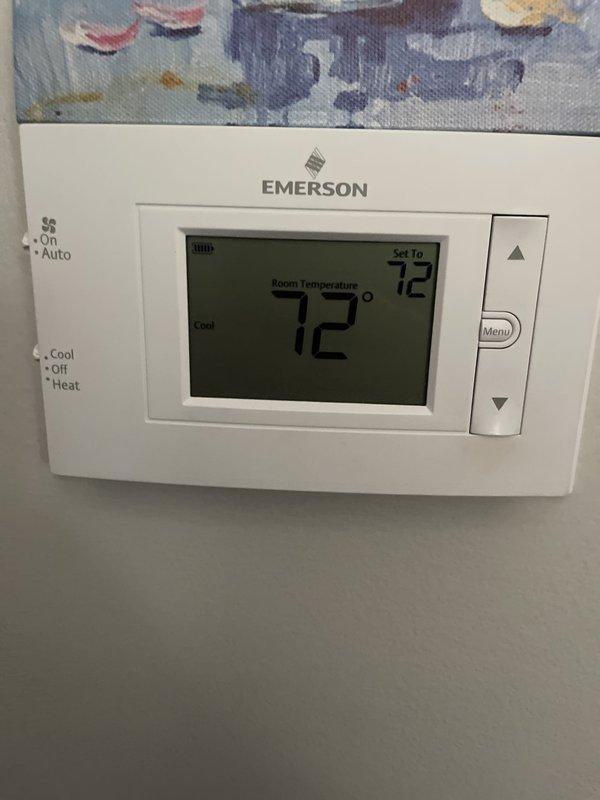 Responded to service call regarding condensation and moisture buildup on 6-year-old Lennox air conditioning system. Upon arrival, performed diagnostic assessment of indoor air handler and evaporator coil assembly. Measured supply air temperature and humidity levels using digital instrumentation to verify system operating parameters. Inspected condensate drainage system, including drain pan, drain line, and trap for proper function and potential blockages. Examined insulation integrity on refrigerant lines and condensate piping for gaps or deterioration that could cause moisture accumulation. Verified thermostat operation and system cycling at setpoint of 72 degrees. Documented system conditions with photographic evidence showing measurement readings and thermostat display. Identified source of excessive condensation and provided recommendations to customer for preventing future moisture-related corrosion issues on equipment and associated piping.