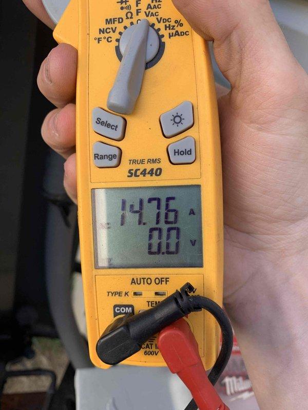 Completed comprehensive cooling maintenance tune-up on 15-year-old air conditioning system. Performed standard diagnostics including amperage draw measurement showing 14.76A, inspected and evaluated evaporator coil condition, and verified all system components operating within normal parameters. System confirmed working properly with no deficiencies noted at time of service.