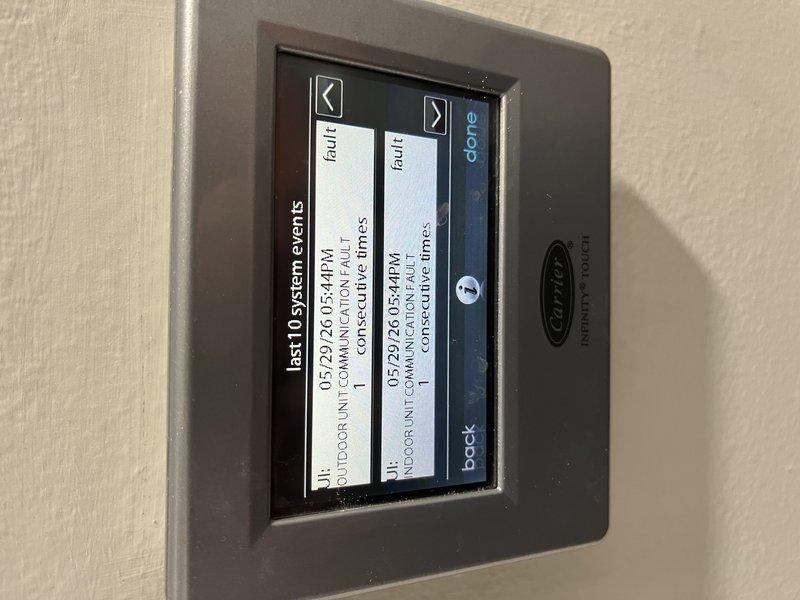 Responded to no cooling complaint on 10+ year old unit at Home Depot service location with reported fault code 179. Upon arrival, accessed thermostat system event log which revealed multiple communication fault errors between the thermostat and HVAC equipment. Documented fault codes and system event history through thermostat interface for diagnostic purposes.