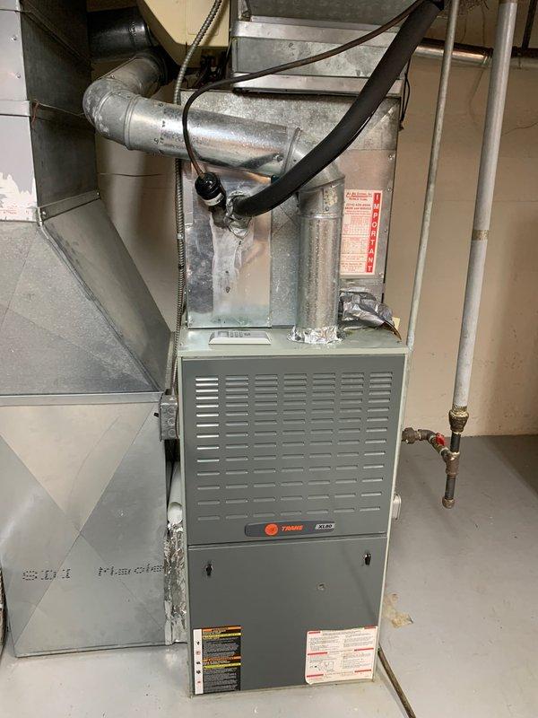 Responded to no cooling complaint on 15-year-old residential AC system. Customer reported weak airflow at room temperature and outdoor fan motor requiring manual start. Upon inspection, diagnosed failed capacitor on condenser fan motor. Replaced defective dual run capacitor and verified proper amperage draw on both compressor and fan motor. Tested system operation with digital manifold gauges, confirmed proper refrigerant pressures and temperatures. System restored to full cooling capacity with normal airflow.