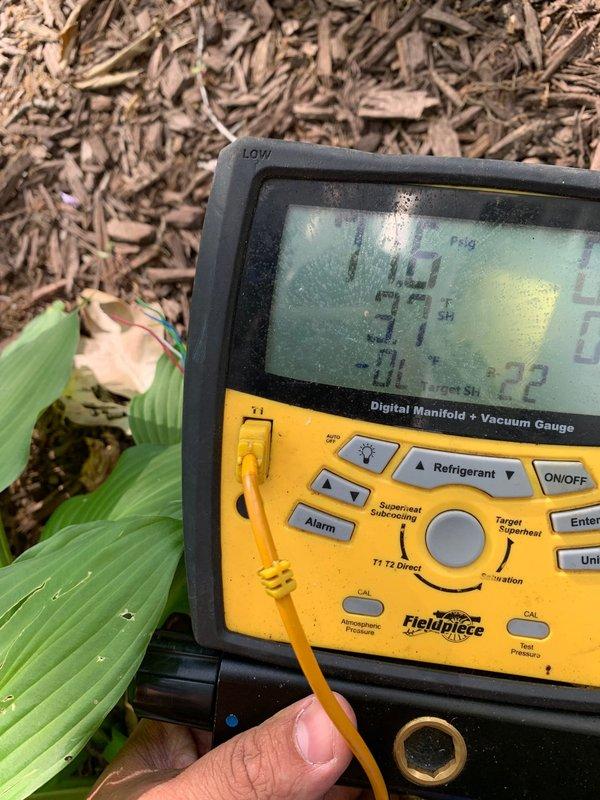 Responded to no cooling complaint on 15-year-old residential AC system. Customer reported weak airflow at room temperature and outdoor fan motor requiring manual start. Upon inspection, diagnosed failed capacitor on condenser fan motor. Replaced defective dual run capacitor and verified proper amperage draw on both compressor and fan motor. Tested system operation with digital manifold gauges, confirmed proper refrigerant pressures and temperatures. System restored to full cooling capacity with normal airflow.