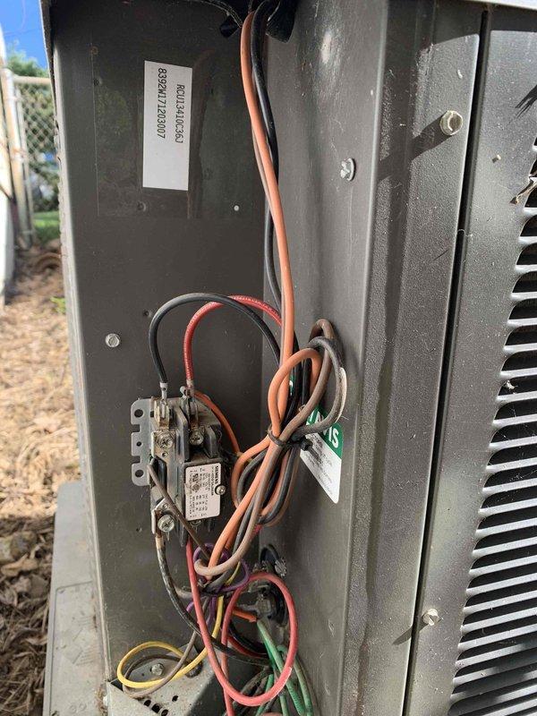 Completed comprehensive tune-up maintenance on outdoor HVAC unit under Home Depot service contract. Performed full system inspection including electrical panel examination, verified all wire connections and terminals, checked capacitor and relay components, and inspected blower motor assembly. All electrical connections found secure, system operating within normal parameters, no accessories required for this maintenance visit.