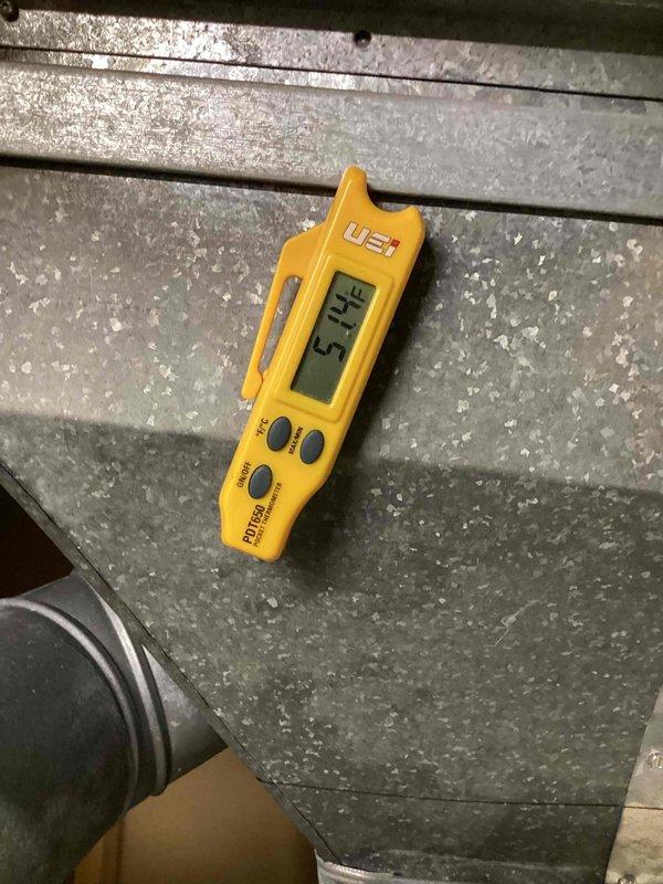Completed comprehensive cooling system tune-up on 4-year-old ground-level AC unit. Performed full system diagnostics including temperature differential measurements across evaporator coil (supply air reading 51.9°F), electrical testing with digital multimeter showing normal amperage draw of 0.32A, and visual inspection of all components. System operating within manufacturer specifications with no deficiencies noted.