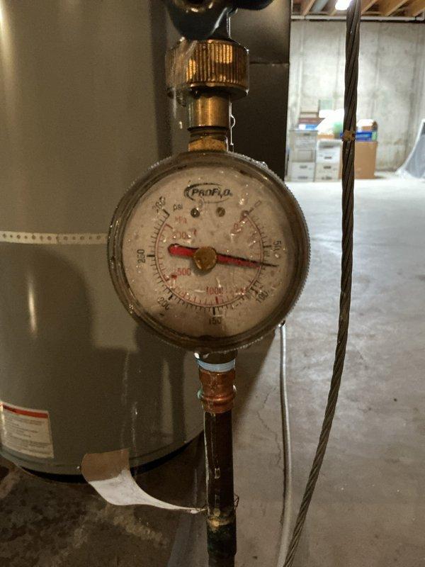 Replaced leaking 2017 gas water heater with new 40-gallon gas tall water heater in basement location. Installed 3/4" ProPress ball valve on cold water supply line. Applied required plumbing identification sticker and obtained permit for installation per code requirements.