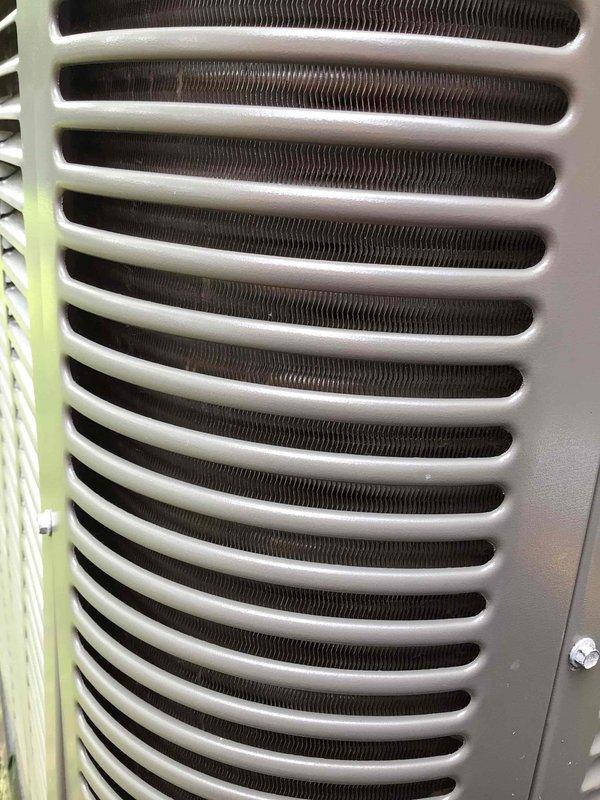 Completed comprehensive cooling system tune-up on 2-year-old Lennox unit per manufacturer specifications. Performed visual inspection of condenser coil assembly, confirming clean fins with no debris accumulation or corrosion present. Inspected control board and electrical connections, verifying all wiring terminals secure and circuit board components functioning properly. Unit operating within normal parameters with no issues identified during service.