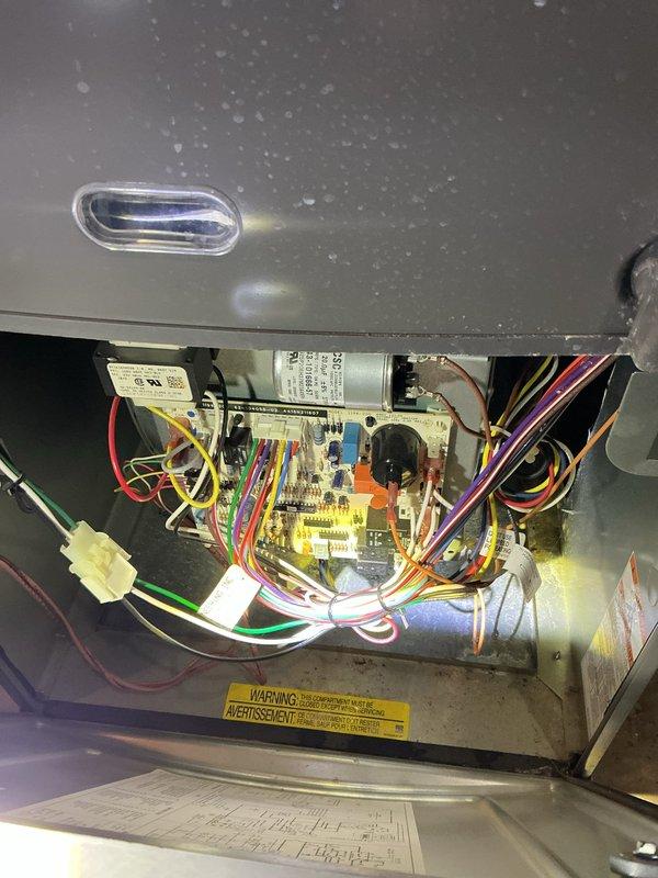 Responded to no cooling call on 9-year-old residential air conditioning system. Upon arrival, accessed indoor unit control panel and outdoor condensing unit to diagnose complete system failure that occurred overnight. Inspected electrical components, circuit board, wiring connections, and capacitor within furnace compartment. Evaluated outdoor condenser unit including fan motor and compressor operation. Identified failed component causing system shutdown. Replaced defective part, restored power to unit, and verified proper system operation with adequate airflow and cooling capacity restored to entire home.