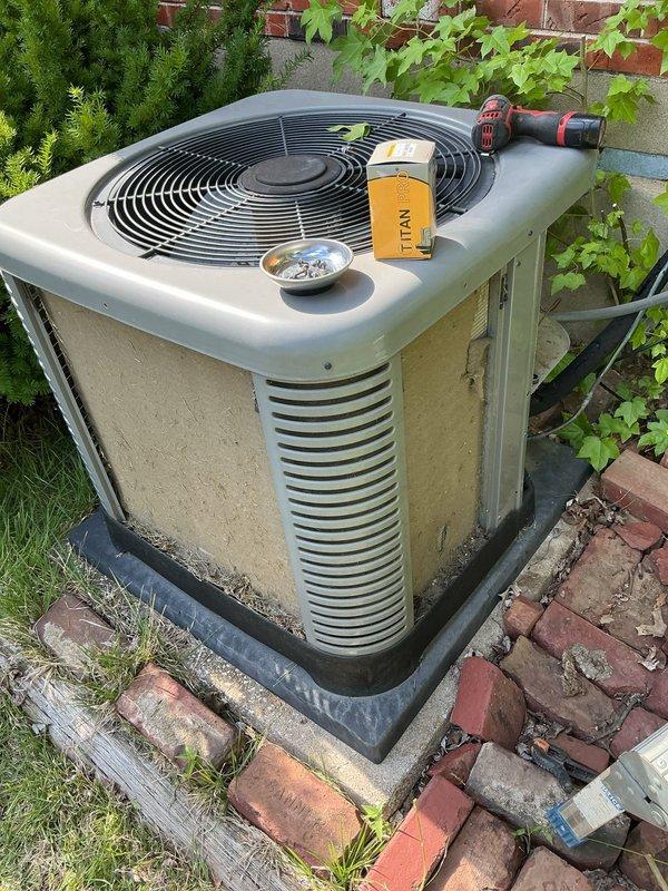 Responded to no cooling call on 9-year-old residential air conditioning system. Upon arrival, accessed indoor unit control panel and outdoor condensing unit to diagnose complete system failure that occurred overnight. Inspected electrical components, circuit board, wiring connections, and capacitor within furnace compartment. Evaluated outdoor condenser unit including fan motor and compressor operation. Identified failed component causing system shutdown. Replaced defective part, restored power to unit, and verified proper system operation with adequate airflow and cooling capacity restored to entire home.