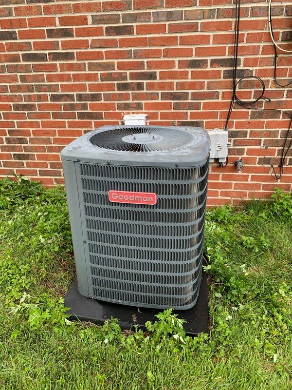 Completed cooling season tune-up on residential Goodman air conditioning unit located in backyard. Performed comprehensive inspection of condenser unit including cleaning of coils, verification of refrigerant levels, electrical connections check, and operational testing to ensure optimal system performance for the cooling season.