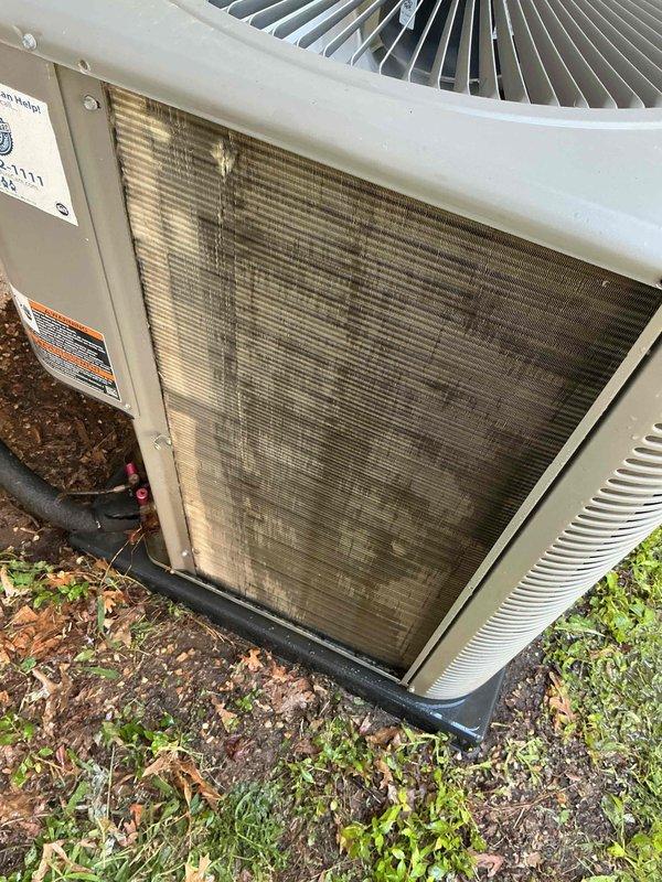Completed seasonal cooling tune-up on single ground-level outdoor condensing unit located in backyard. Performed comprehensive maintenance inspection including electrical connections, refrigerant lines, and condenser coil assessment. Noted significant debris accumulation and soiling on condenser coil fins requiring attention for optimal system efficiency.