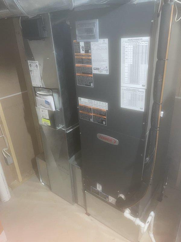 Replaced defective thermal expansion valve (TXV) on Lennox air handler unit under warranty coverage. System tested and verified operational in cooling mode with thermostat responding properly to temperature setpoints. Defective component disposed of per warranty protocol.