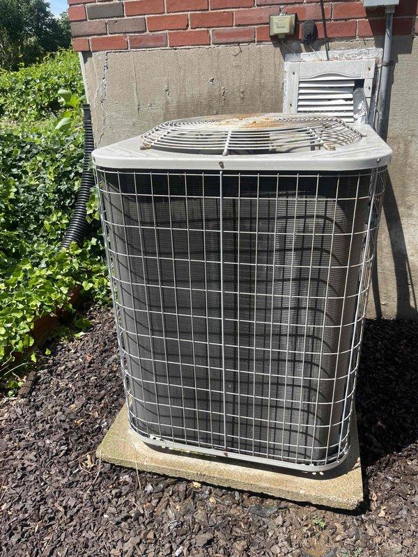 Completed comprehensive air conditioning tune-up on single outdoor condensing unit positioned on concrete pad adjacent to building exterior. Performed standard preventive maintenance procedures including inspection of condenser coils, fan motor operation, electrical connections, and refrigerant levels. Unit found in operational condition with all components functioning within normal parameters; no repairs required at this time.