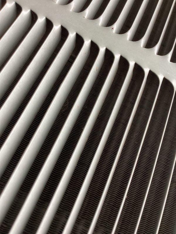 Completed comprehensive HVAC tune-up maintenance service for Home Depot work order. Performed system inspection, replaced air filter with new pleated media filter, and inspected heat exchanger coils which showed clean condition with no debris accumulation or corrosion present.