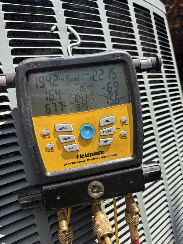 Responded to no cooling complaint on 10+ year old outdoor unit. Upon arrival, performed diagnostic testing using refrigerant manifold gauges to measure system pressures and temperatures. Readings indicated abnormal operating conditions with high-side pressure at 194.7 PSI and temperature differential showing 61°F and 255.6°F. Identified refrigerant system issue requiring repair, and customer was advised of findings and repair options.