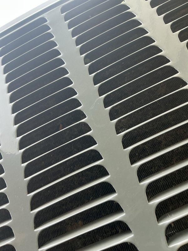 Completed preventive maintenance tune-up on a single heat pump/air conditioner unit, model CAPTA802X25AA, located in the side yard. Performed comprehensive system inspection including cleaning of air return grille, verification of refrigerant levels, and assessment of all operational components. Unit is 0-5 years old and confirmed to be functioning properly with all safety labels and manufacturer specifications intact.