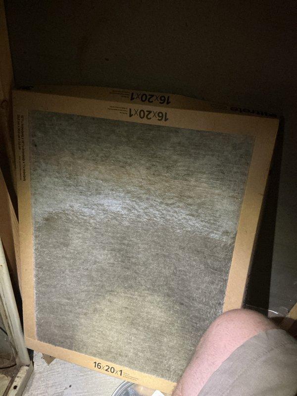 Completed preventive maintenance tune-up on residential HVAC system. Inspected evaporator coil assembly and refrigerant lines in attic installation, verified proper connection of filter drier and copper tubing components. Replaced dirty 16x20x1 air filter showing significant dust accumulation to restore proper airflow and system efficiency.