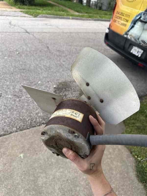 Responded to service call for rattling noise in outdoor condensing unit following recent roof work. Upon inspection, diagnosed failed condenser fan motor with damaged bearings causing reported rattling sound. Removed and replaced defective motor assembly with new unit, tested system operation, and confirmed proper function with no abnormal sounds present.
