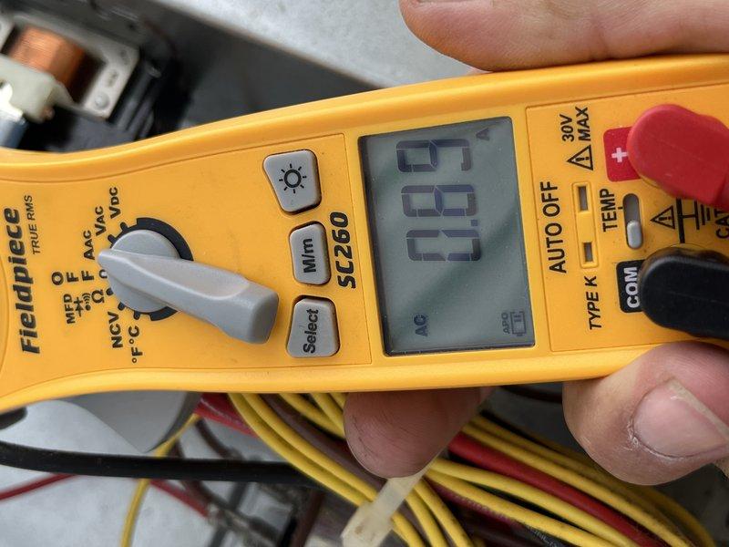 Responded to no cooling complaint on ground-mounted Coleman condensing unit. Upon arrival, confirmed condenser fan motor was inoperative while compressor attempted to run. Performed electrical diagnostics using multimeter, measuring voltage at fan motor terminals and verifying power supply to unit. Testing revealed fan motor failure preventing proper heat rejection from condenser coil. Advised customer of findings and provided repair options to restore cooling operation.